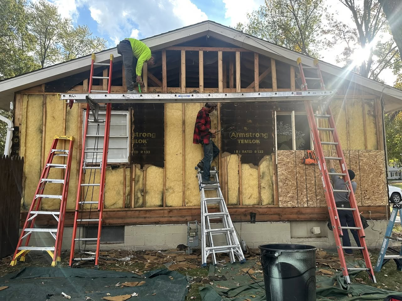 Siding replacement — demo and re-side in progress